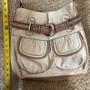 BMakowsky cream colored soft leather handbag.
